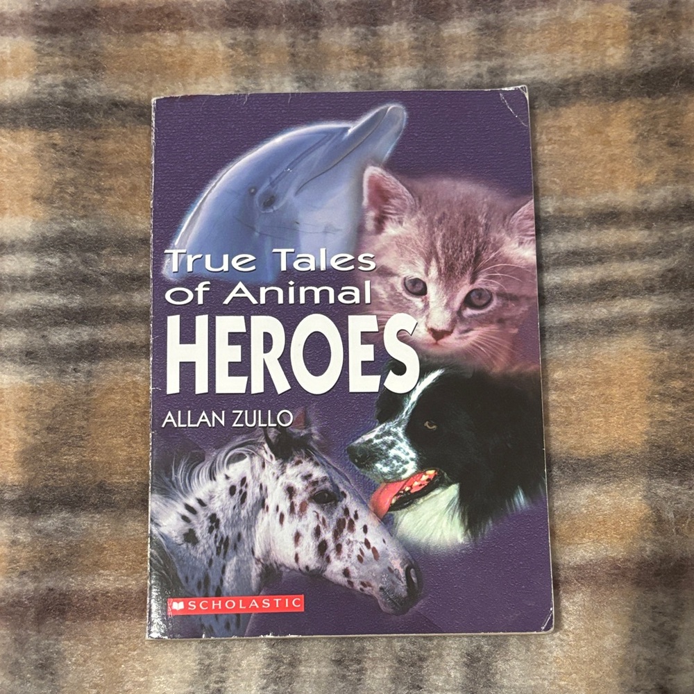 Scholastic True Tales of Animal Heroes - Purple Cover with Animal Illustrations